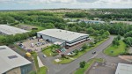 An aerial photograph of a commercial warehouse to be advertised in a commercial brochure giving that greater perspective of the site